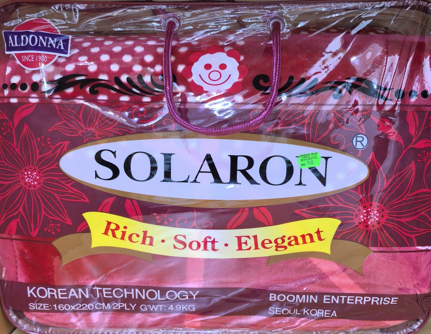 This is a red patterned Aldonna Solaron Korean technology blanket
